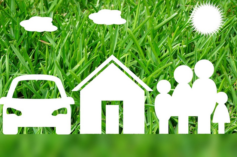 Car, home, family image on green background