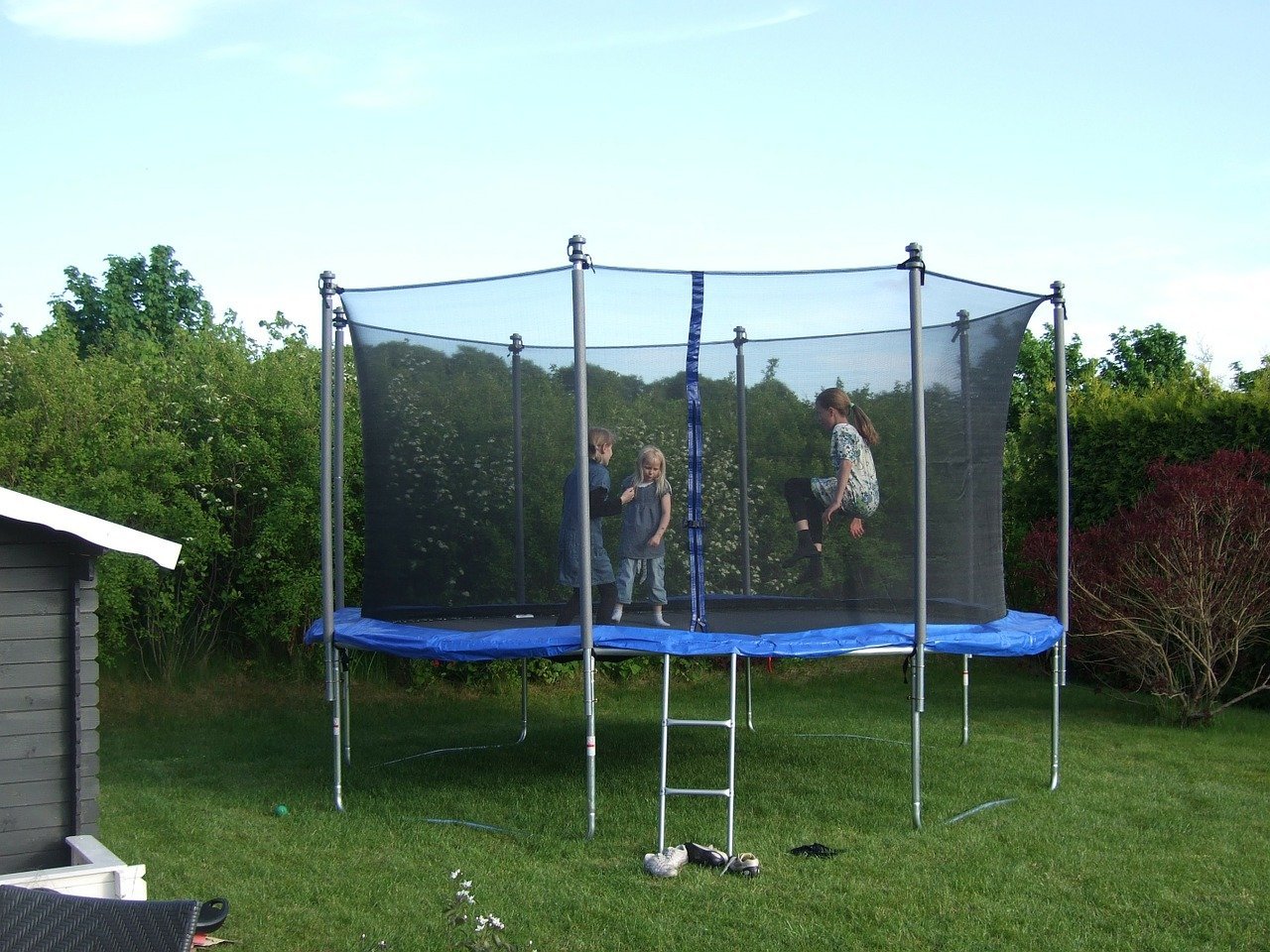Children jumping on a trampoline